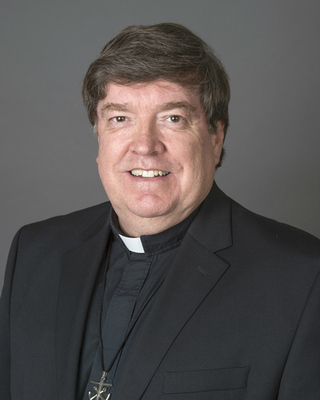 Rev. James K. Foster, C.S.C.