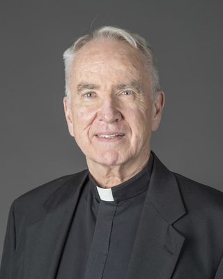 Rev. Oliver F. Williams, C.S.C.