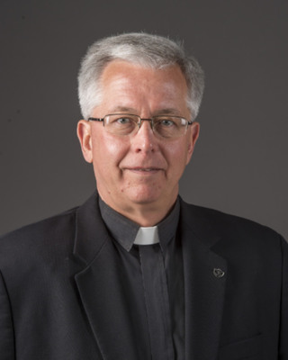Rev. Michael E. Connors, C.S.C.