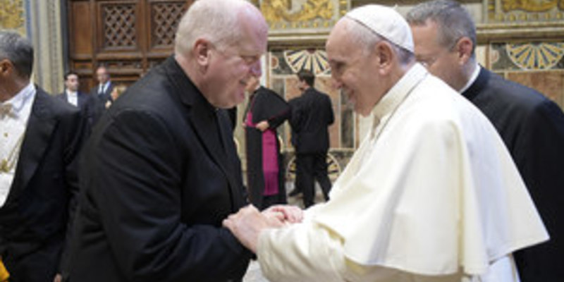 Rev. James M. Lies, C.S.C., meets Pope Francis during a conference at the Vatican