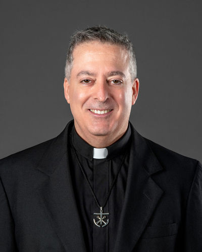 Rev. John M.  DeRiso, C.S.C.